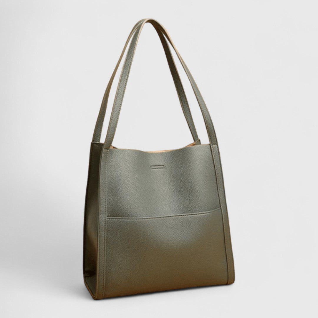 Plousia - Bolso de hombro de piel con un diseño sencillo y elegante