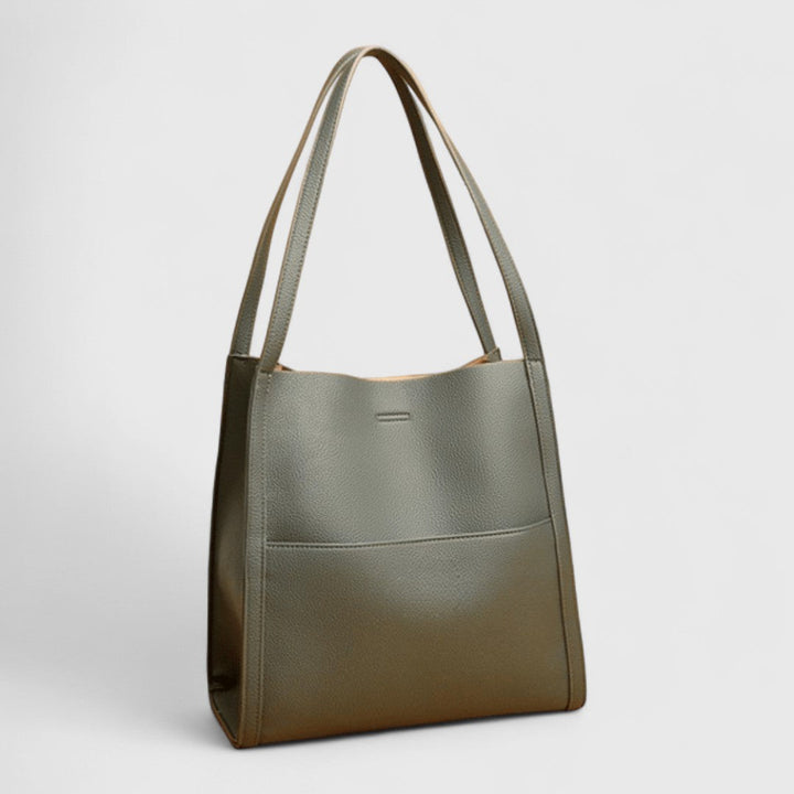Plousia - Bolso de hombro de piel con un diseño sencillo y elegante