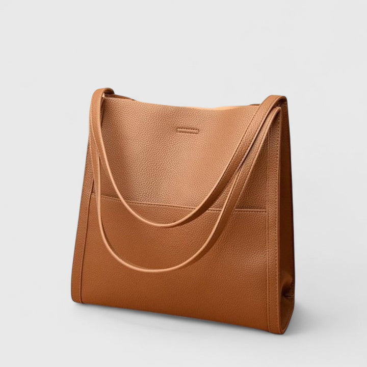 Plousia - Bolso de hombro de piel con un diseño sencillo y elegante