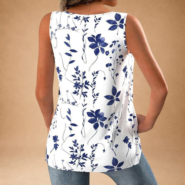 Blusa blanca con flores azules