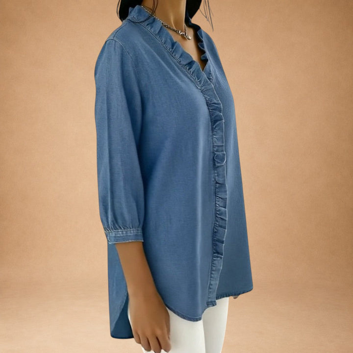 Elena – elegant bluse med flæser