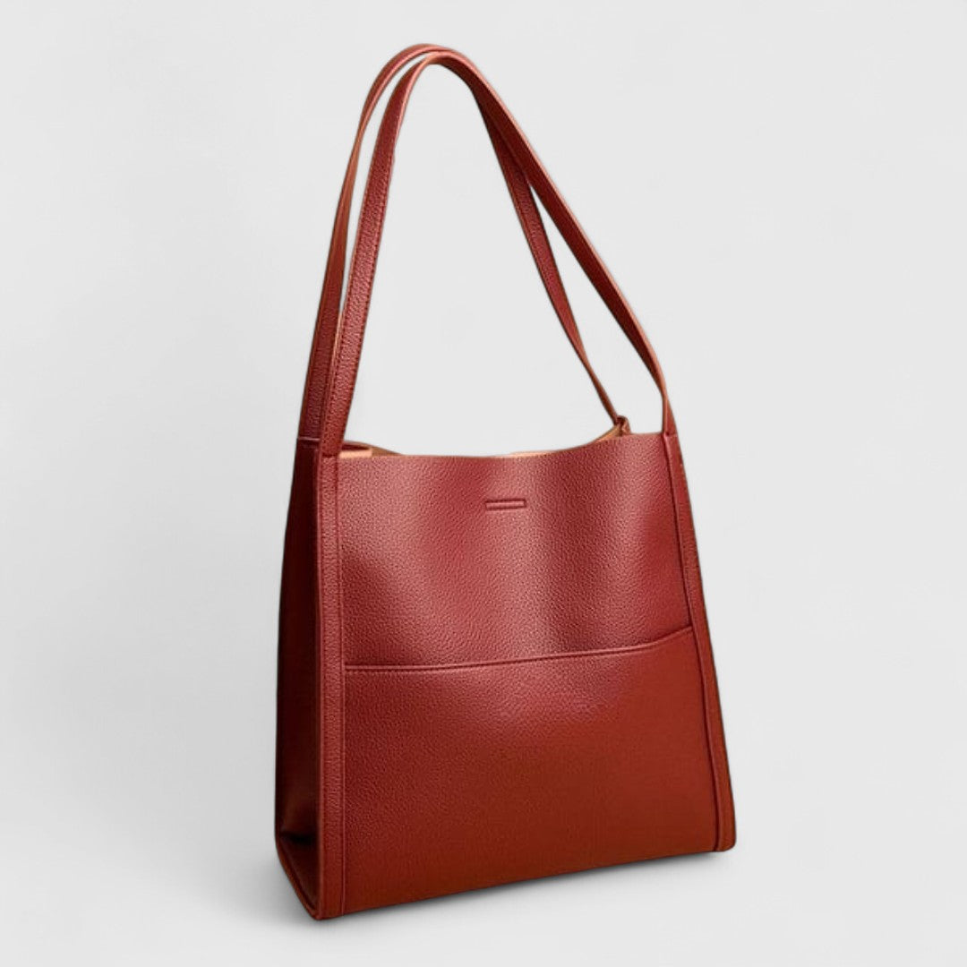 Plousia - Bolso de hombro de piel con un diseño sencillo y elegante