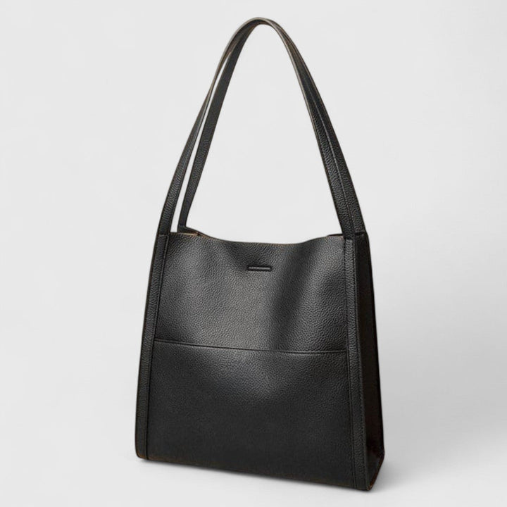 Plousia - Bolso de hombro de piel con un diseño sencillo y elegante