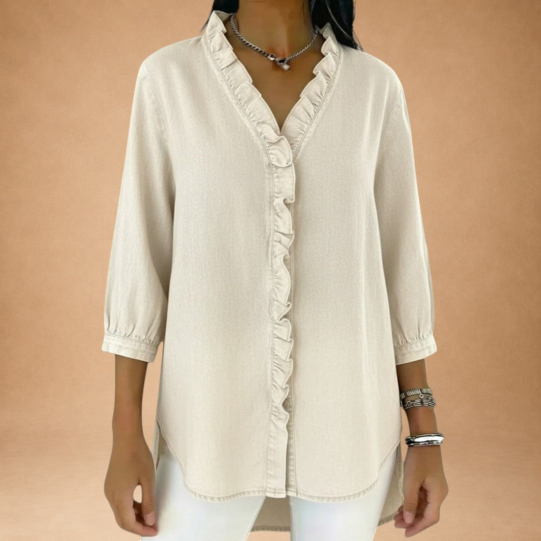 Elena – elegant bluse med flæser