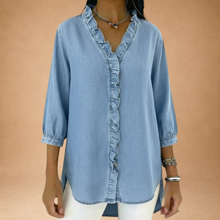 Elena – elegant bluse med flæser