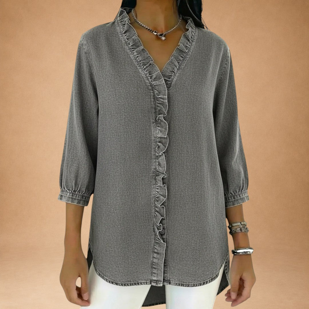 Elena – elegant bluse med flæser