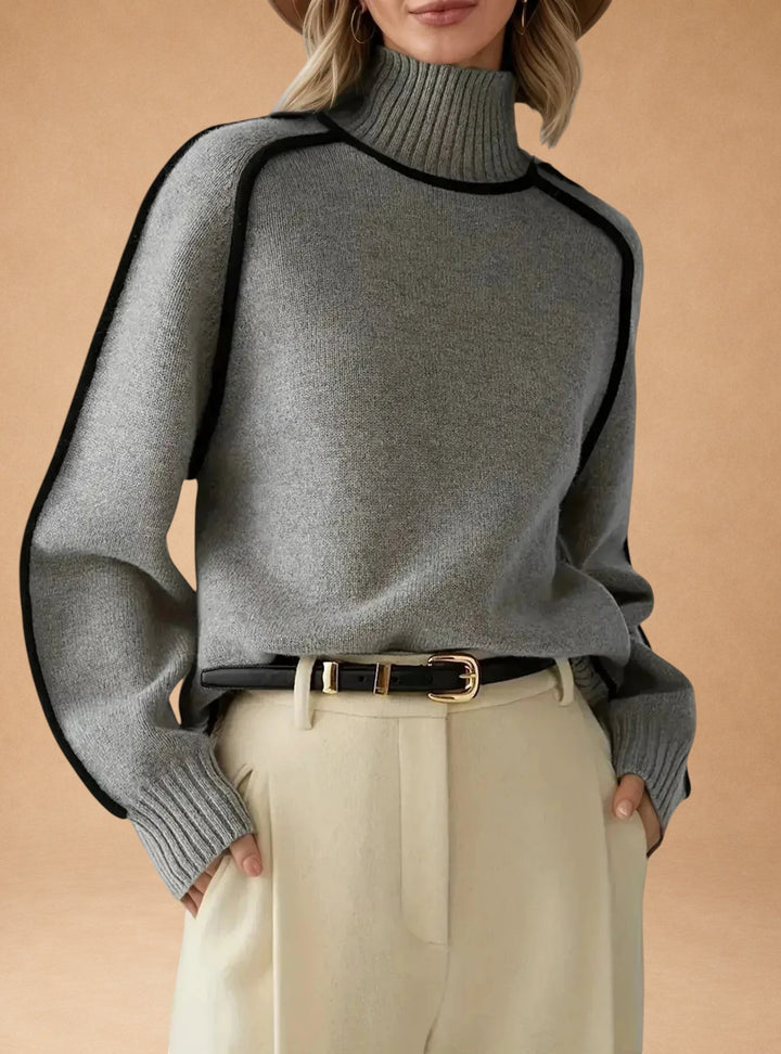 Vasiliki – Elegant ensfarvet sweater med høj krave