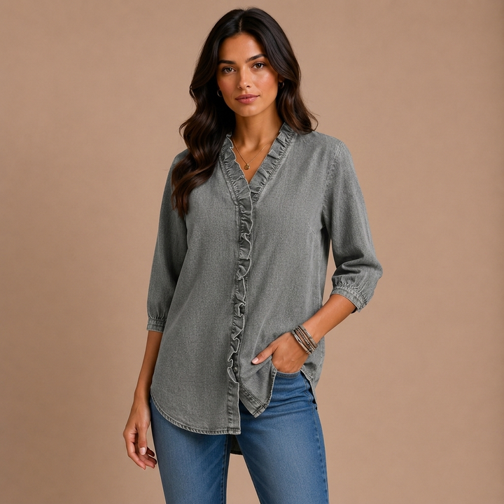 Elena – elegant bluse med flæser