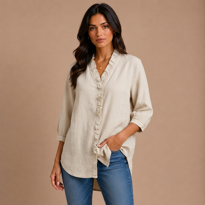 Elena – elegant bluse med flæser
